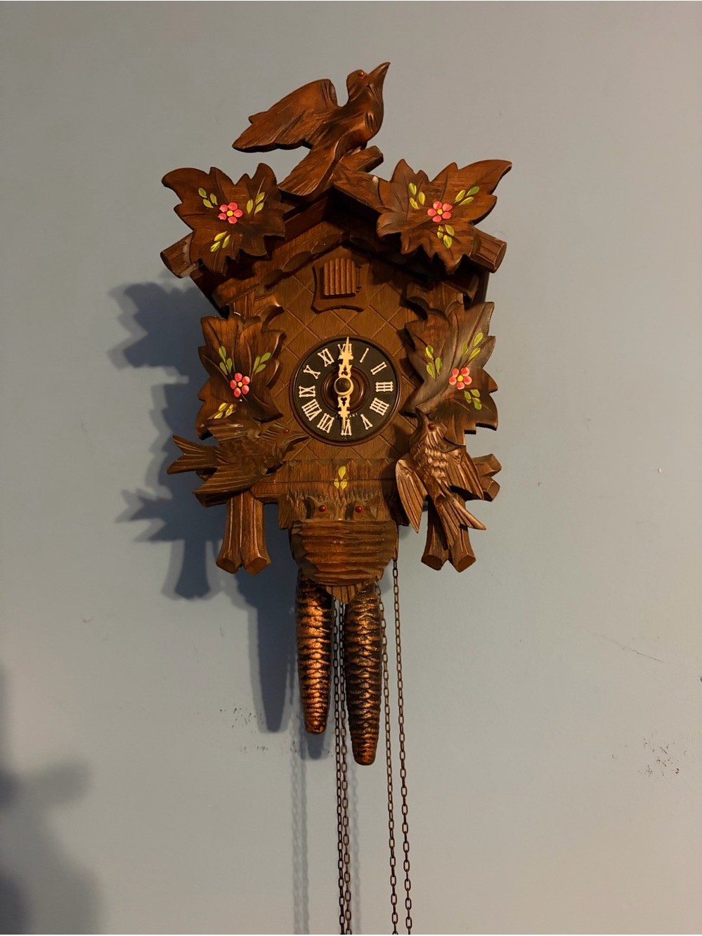 Hand-Carved Wooden Cuckoo Clock in Warm Brown